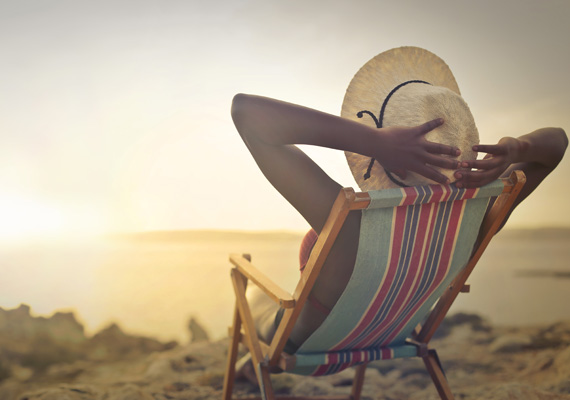 Person on beach chair Person on beach chair